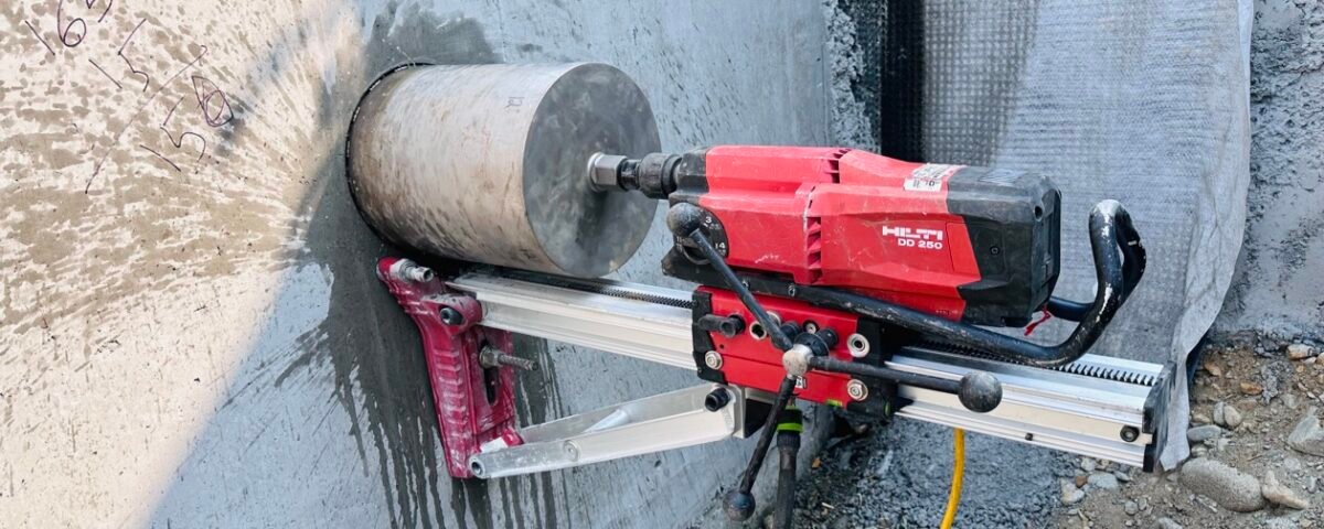 Hilti DD 250 diamond core drill rig coring a concrete wall in Vancouver, BC